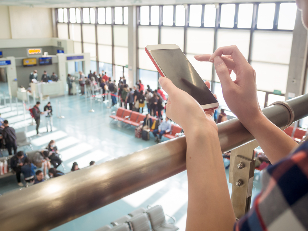 mobile at airport, how to plan a first trip abroad